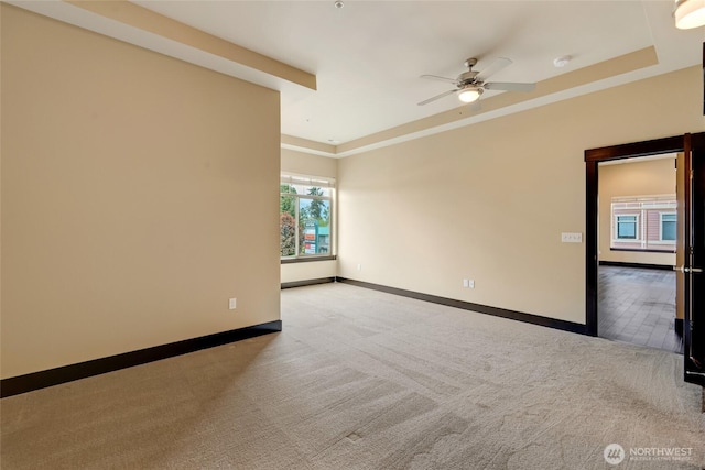 4020 NE 3rd Pl Unit B, Renton, WA 98056 - carpeted spare room with a ceiling fan and baseboards