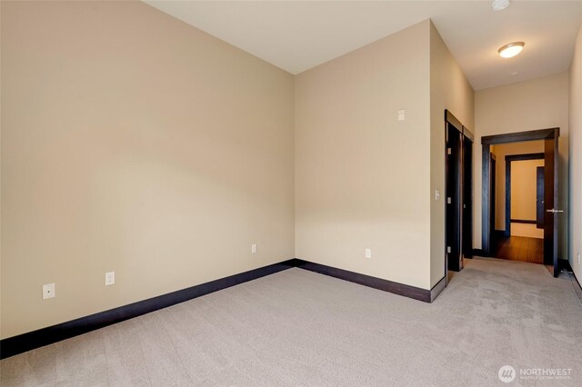 4020 NE 3rd Pl Unit B, Renton, WA 98056 - carpeted empty room with baseboards