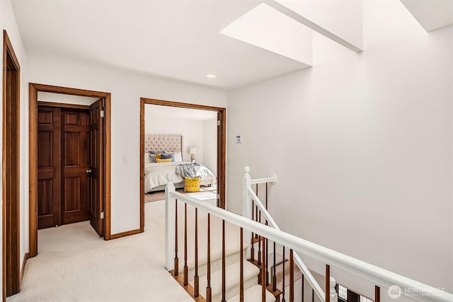 6220 146th Pl SE, Bellevue, WA 98006 - hall featuring light carpet, an upstairs landing, baseboards, and recessed lighting