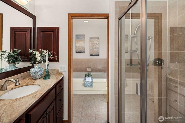 6220 146th Pl SE, Bellevue, WA 98006 - full bath featuring vanity, a shower stall, a garden tub, and tile patterned floors