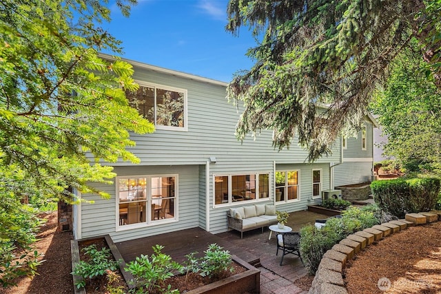 6220 146th Pl SE, Bellevue, WA 98006 - rear view of house with outdoor lounge area and a wooden deck