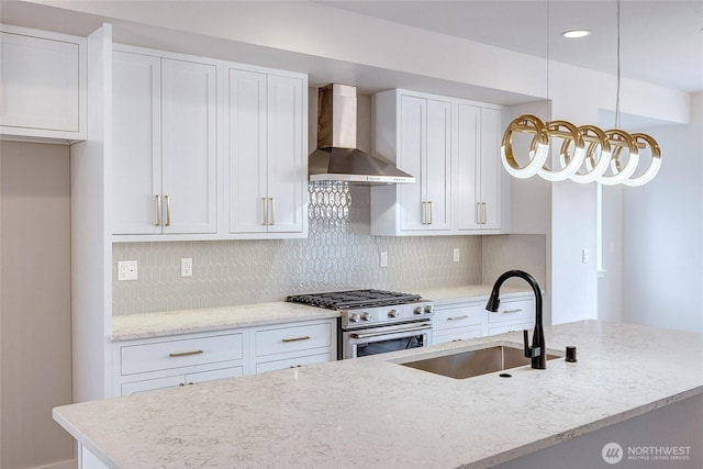 6726 NE 187th St Unit 104, Kenmore, WA 98028 - kitchen featuring wall chimney exhaust hood, high end stove, a sink, white cabinetry, and recessed lighting