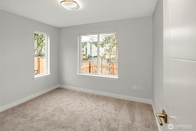 6726 NE 187th St Unit 104, Kenmore, WA 98028 - carpeted empty room with healthy amount of natural light and baseboards