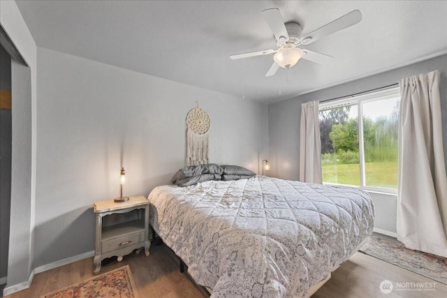 32509 80th Dr NW, Stanwood, WA 98292 - bedroom featuring wood finished floors, baseboards, and ceiling fan
