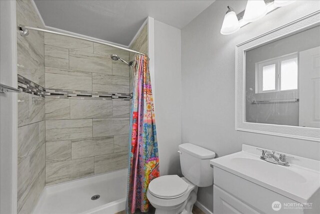 32509 80th Dr NW, Stanwood, WA 98292 - bathroom with toilet, vanity, and tiled shower