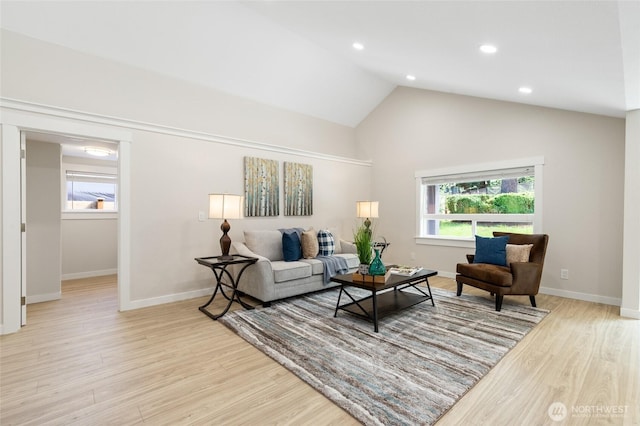 20103 75th Ave NE, Kenmore, WA 98028 - living room featuring plenty of natural light, light wood-style flooring, baseboards, high vaulted ceiling, and recessed lighting