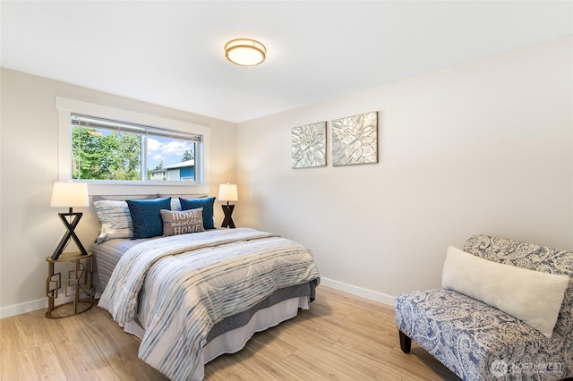 20103 75th Ave NE, Kenmore, WA 98028 - bedroom featuring baseboards and light wood-style floors