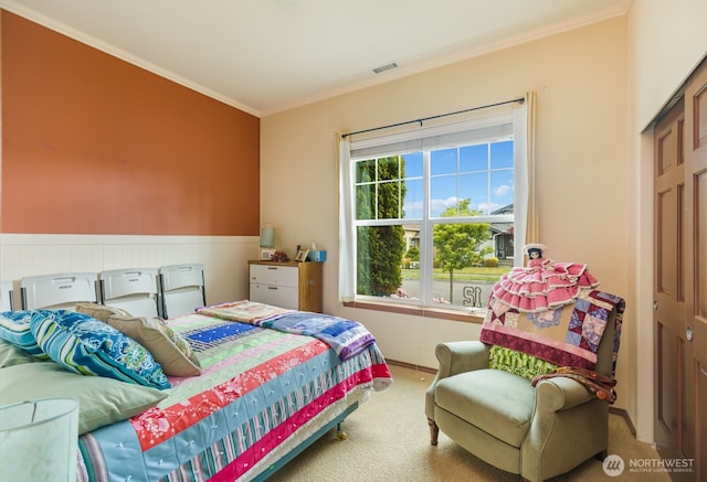 bedroom featuring carpet floors and ornamental molding