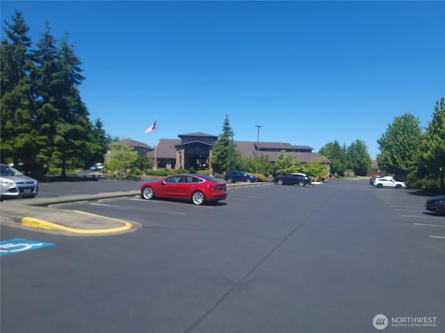 8516 Bainbridge Loop NE, Lacey, WA 98516 - view of asphalt road featuring curbs