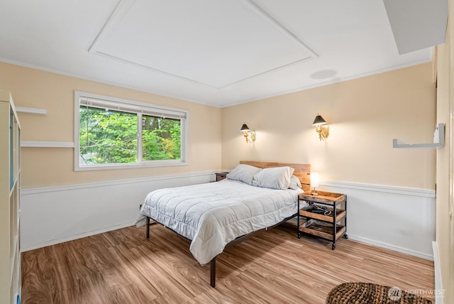 1933 Dayton Dr SE, Renton, WA 98055 - bedroom featuring attic access, wood finished floors, baseboards, and crown molding