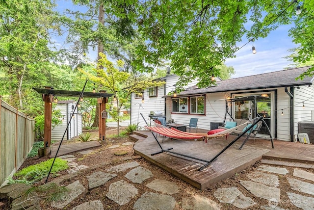 1933 Dayton Dr SE, Renton, WA 98055 - back of house featuring a wooden deck and a shingled roof