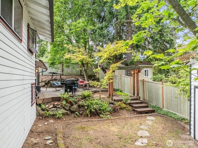 1933 Dayton Dr SE, Renton, WA 98055 - fenced backyard featuring a wooden deck