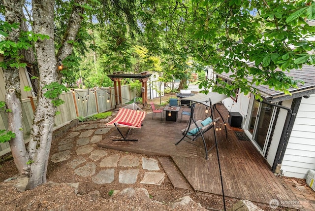 1933 Dayton Dr SE, Renton, WA 98055 - fenced backyard with outdoor dining area, a wooden deck, and central AC unit