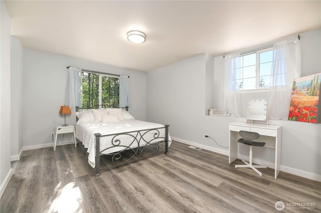 1416 116th Dr SE, Lake Stevens, WA 98258 - bedroom featuring wood finished floors, baseboards, and an office area