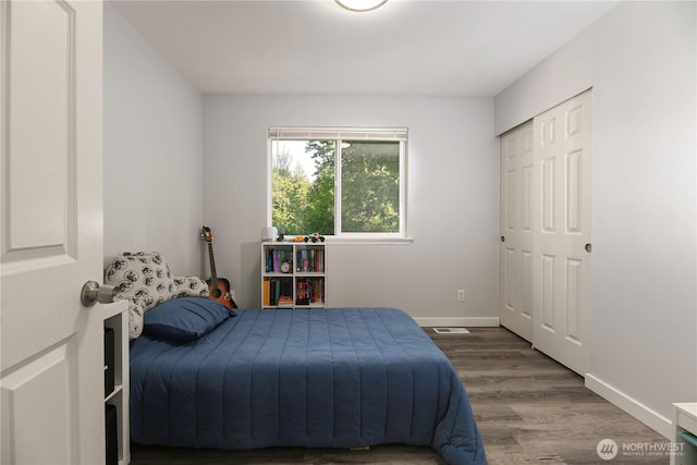 1416 116th Dr SE, Lake Stevens, WA 98258 - bedroom with wood finished floors, baseboards, and a closet