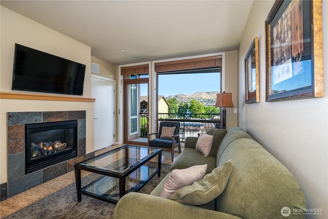 2220 W Woodin Ave Unit 210, Chelan, WA 98816 - living area with a mountain view and a fireplace
