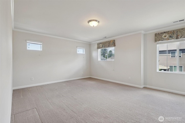 25214 113th Ave SE, Kent, WA 98030 - carpeted empty room with ornamental molding, baseboards, and healthy amount of natural light