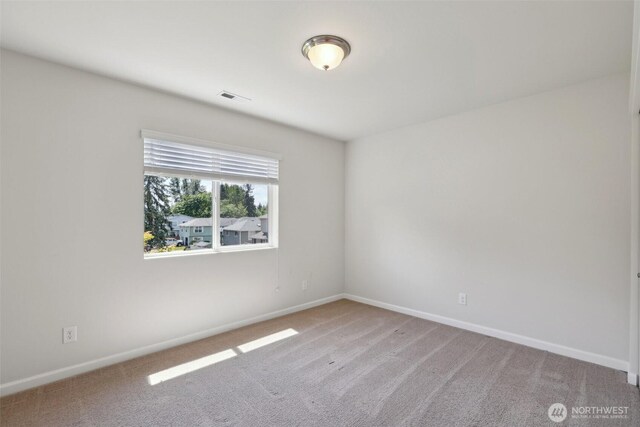 25214 113th Ave SE, Kent, WA 98030 - carpeted spare room with baseboards