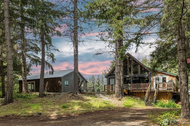 340 Sunshine Way, Cle Elum, WA 98922 - back of house at dusk with a wooden deck and stairway