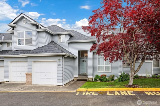 12018 SE 312th Pl Unit 3B, Auburn, WA 98092 - view of front of home with a shingled roof, entry steps, and an attached garage