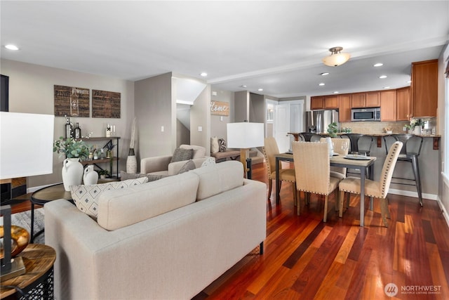 830 15th Ave Unit A, Seattle, WA 98122 - living room featuring recessed lighting, dark wood-style floors, and baseboards