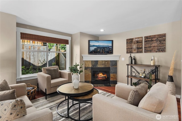 830 15th Ave Unit A, Seattle, WA 98122 - living area featuring wood finished floors, a tile fireplace, and recessed lighting