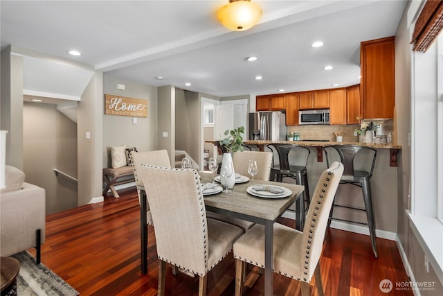 830 15th Ave Unit A, Seattle, WA 98122 - dining room with dark wood-type flooring, baseboards, and recessed lighting