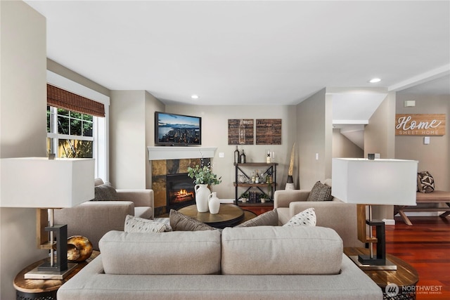 830 15th Ave Unit A, Seattle, WA 98122 - living room featuring wood finished floors, a tile fireplace, recessed lighting, and baseboards