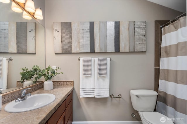 830 15th Ave Unit A, Seattle, WA 98122 - full bath with toilet, vanity, and a shower with shower curtain