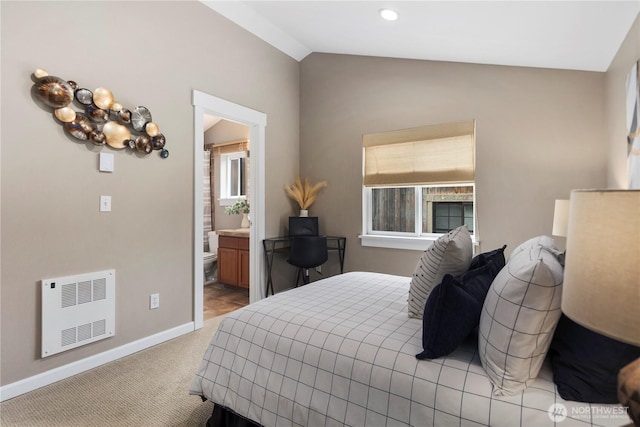 830 15th Ave Unit A, Seattle, WA 98122 - bedroom with heating unit, baseboards, vaulted ceiling, light carpet, and recessed lighting