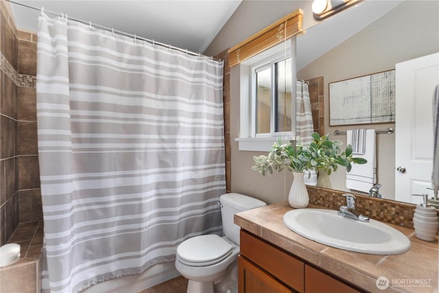830 15th Ave Unit A, Seattle, WA 98122 - bathroom with toilet, vanity, a shower with shower curtain, and vaulted ceiling