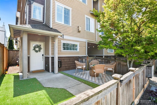 2643A NW 59th St, Seattle, WA 98107 - rear view of property with a fenced backyard and a patio