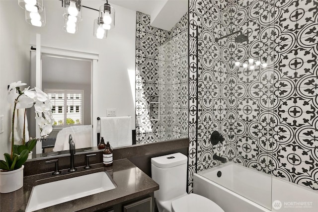 2643A NW 59th St, Seattle, WA 98107 - bathroom with toilet, vanity, washtub / shower combination, and a chandelier