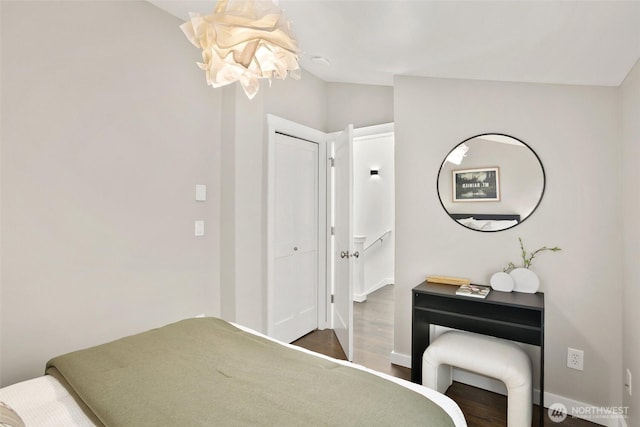 2643A NW 59th St, Seattle, WA 98107 - bedroom featuring wood finished floors, a closet, baseboards, and lofted ceiling