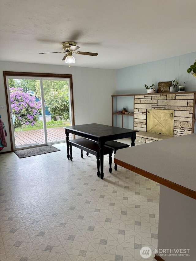 2 Quinault Way, La Conner, WA 98257 - recreation room with ceiling fan, light floors, and a fireplace