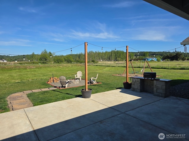 144 Faun Rae Ln, Chehalis, WA 98532 - view of patio / terrace with an outdoor fire pit