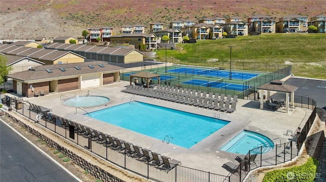 9159 Riverview Way NW Unit D39, Quincy, WA 98848 - community pool with a residential view and a tennis court