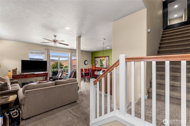 9159 Riverview Way NW Unit D39, Quincy, WA 98848 - living room featuring stairs, carpet, ceiling fan, and recessed lighting