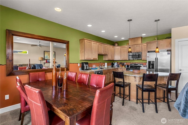 9159 Riverview Way NW Unit D39, Quincy, WA 98848 - dining room featuring light carpet, ceiling fan, recessed lighting, and baseboards