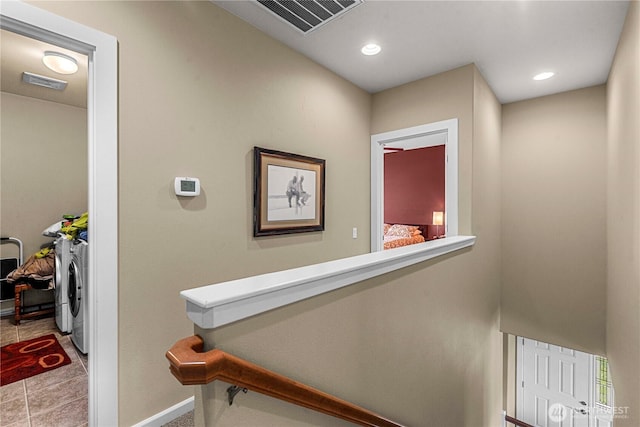 9159 Riverview Way NW Unit D39, Quincy, WA 98848 - hallway with independent washer and dryer, baseboards, recessed lighting, and tile patterned flooring