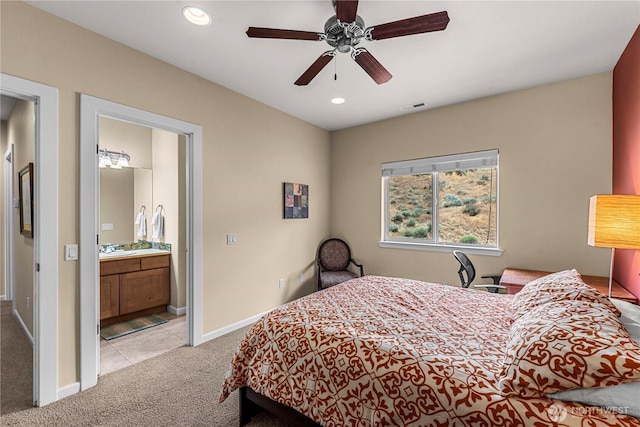 9159 Riverview Way NW Unit D39, Quincy, WA 98848 - bedroom featuring light colored carpet, baseboards, recessed lighting, ensuite bathroom, and a ceiling fan