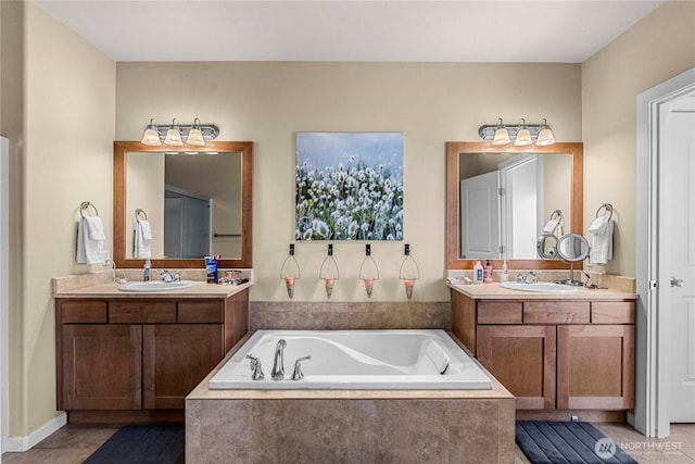 9159 Riverview Way NW Unit D39, Quincy, WA 98848 - bathroom featuring a garden tub and two vanities