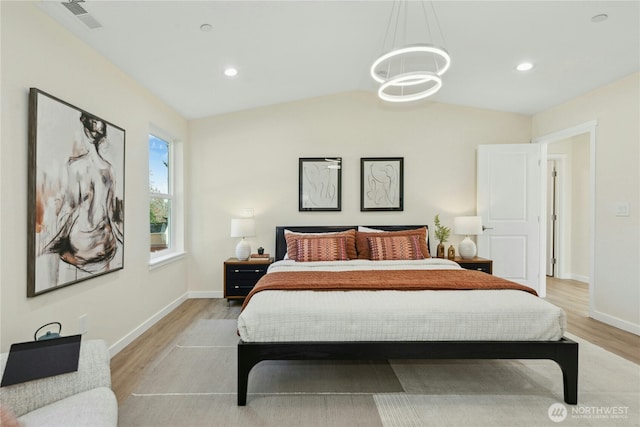 121 120th St SE Unit B, Everett, WA 98208 - bedroom with light wood finished floors, a chandelier, vaulted ceiling, and recessed lighting
