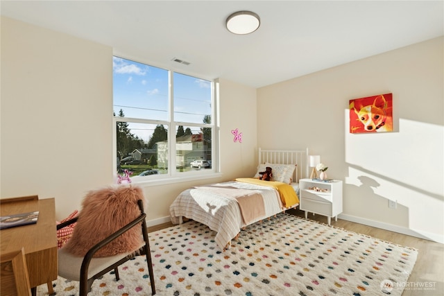 121 120th St SE Unit B, Everett, WA 98208 - bedroom featuring wood finished floors and baseboards