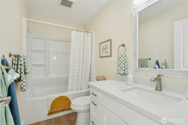 121 120th St SE Unit B, Everett, WA 98208 - full bathroom featuring vanity, shower / bath combo with shower curtain, and wood finished floors