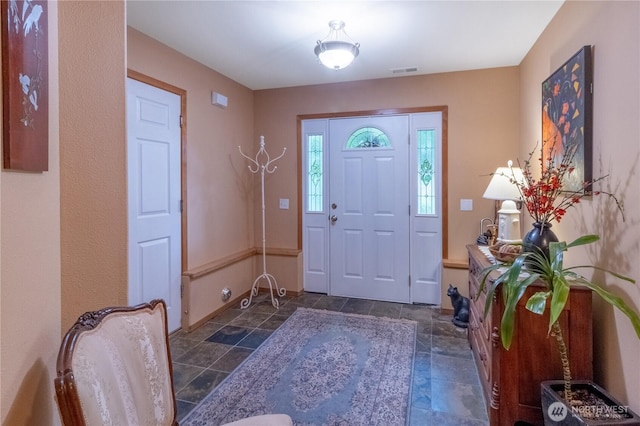 22 Inlet Cir, Bellingham, WA 98229 - foyer entrance with stone tile flooring and baseboards
