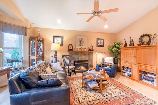 22 Inlet Cir, Bellingham, WA 98229 - living area featuring vaulted ceiling, ceiling fan, a tile fireplace, and recessed lighting