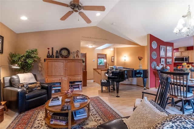 22 Inlet Cir, Bellingham, WA 98229 - living area featuring vaulted ceiling, a chandelier, a ceiling fan, light wood-type flooring, and recessed lighting