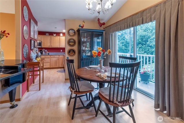 22 Inlet Cir, Bellingham, WA 98229 - dining room featuring a chandelier, light wood finished floors, and vaulted ceiling