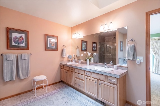 22 Inlet Cir, Bellingham, WA 98229 - bathroom featuring double vanity, tiled shower, baseboards, and tile patterned flooring